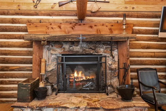 a roof deck with a table and chairs