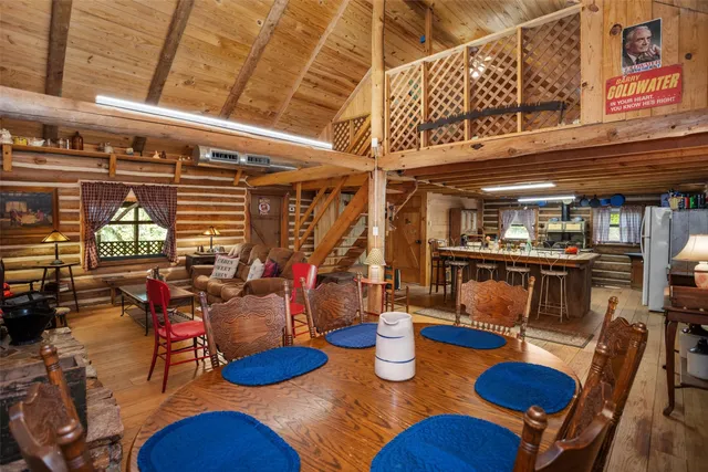 a view of a patio with table and chairs