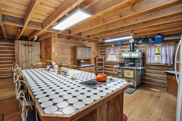 a view of workspace with wooden floor
