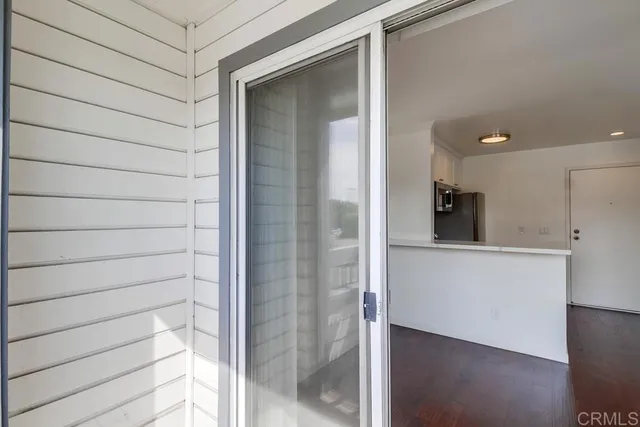 a bathroom with a shower and a sink