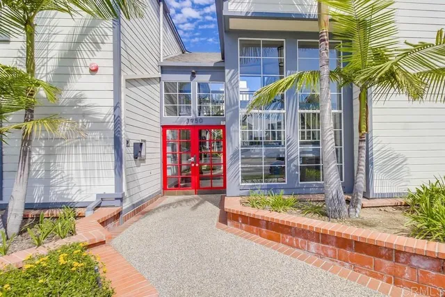 a view of a chairs and table in a patio