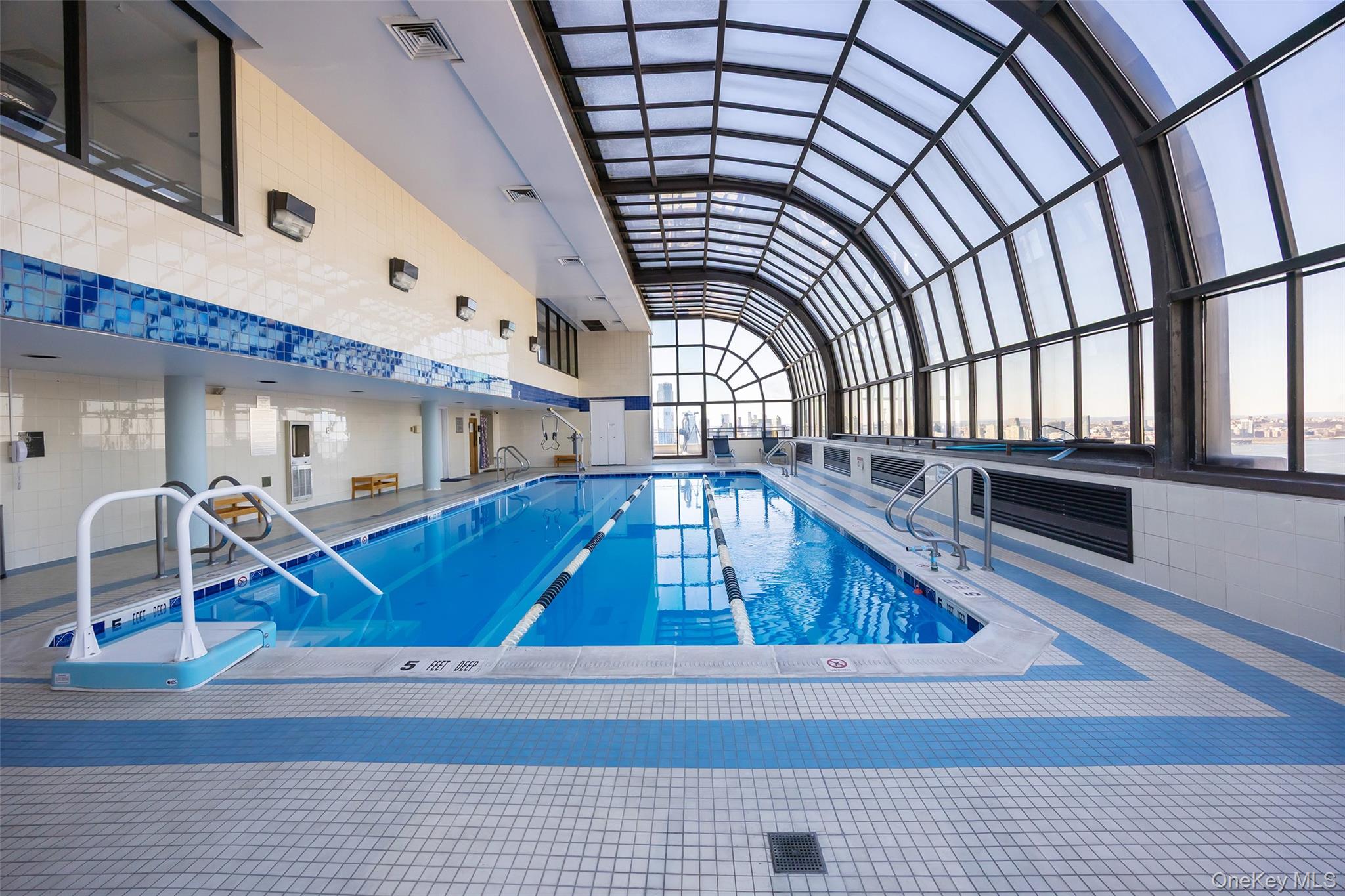200 Rector Place, Unit 43D Manhattan, NY 10280 - Photo 16 of 27 a view of swimming pool with seating space