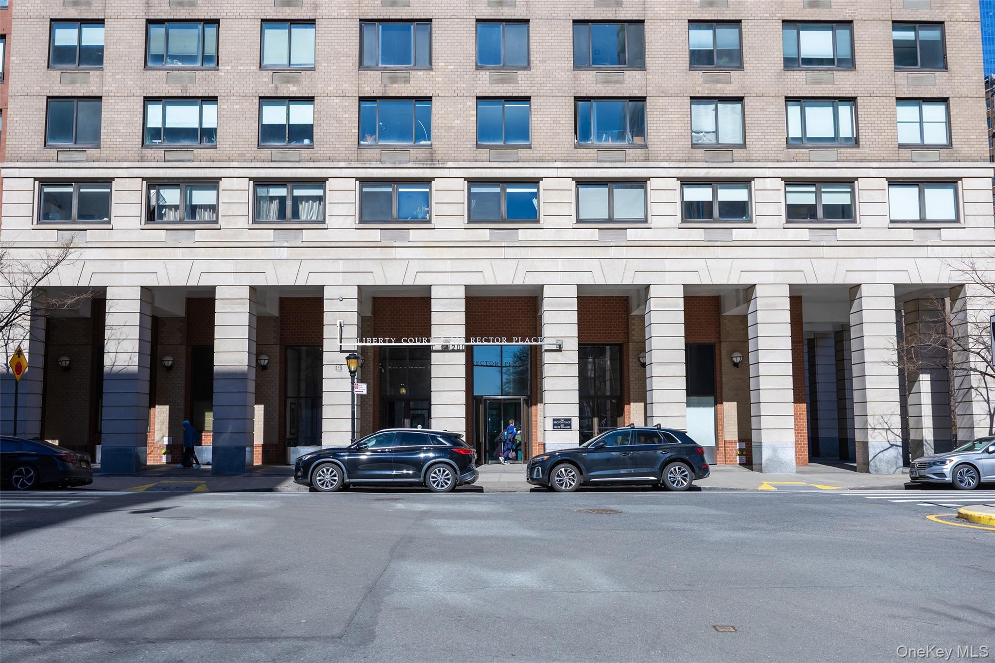 200 Rector Place, Unit 43D Manhattan, NY 10280 - Photo 23 of 27 a view of a building with car parked