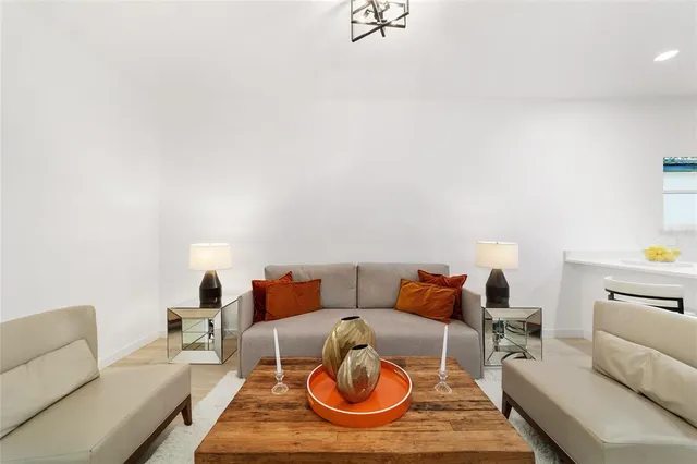 a living room with furniture and a couch