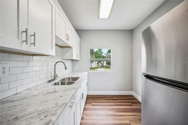 a front view of house with yard and seating space