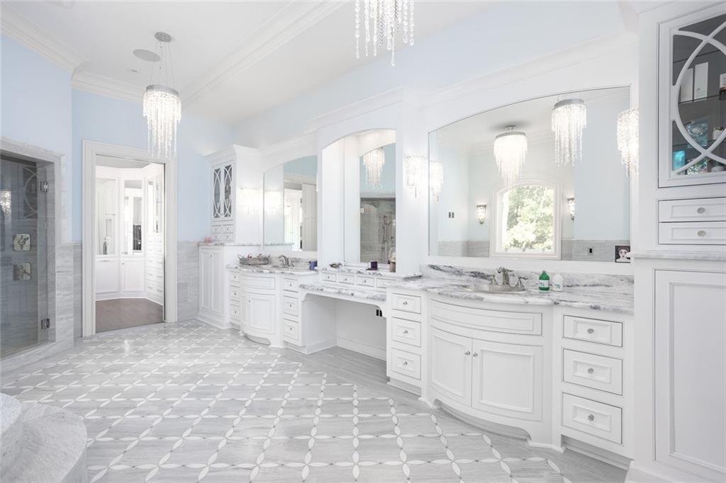 3084 George Williams Road Monroe, GA 30656 - Photo 23 of 55 a large white kitchen with a large window