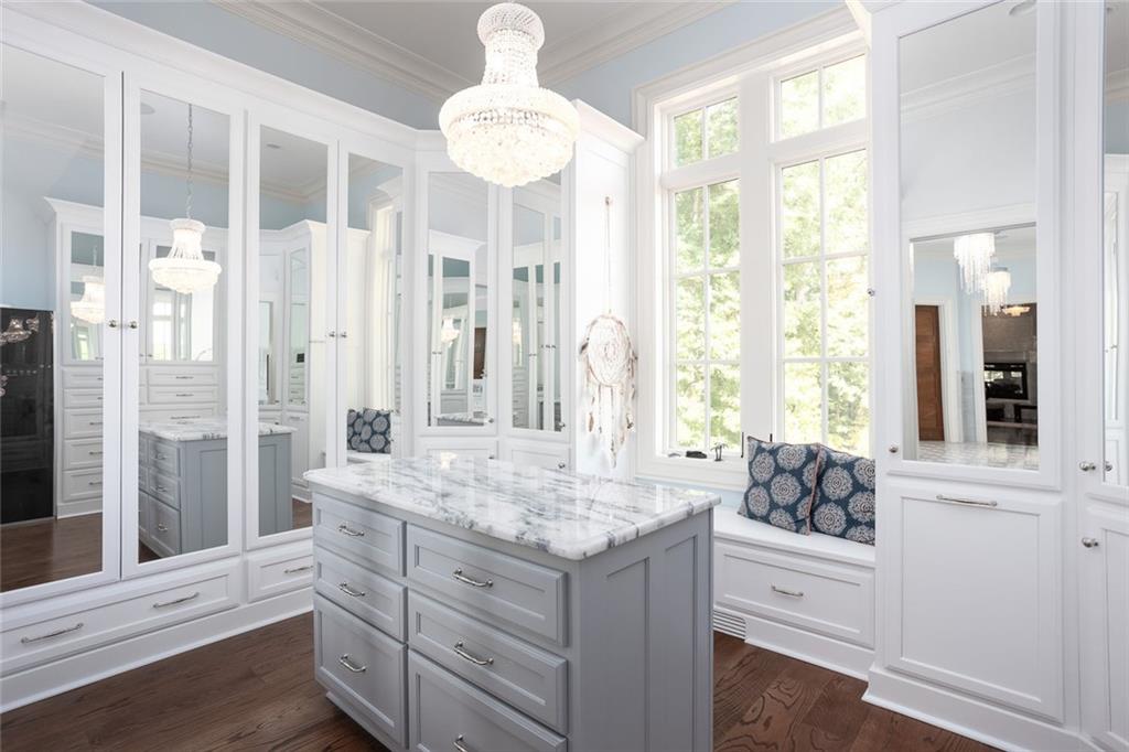 3084 George Williams Road Monroe, GA 30656 - Photo 25 of 55 a bathroom with a granite countertop sink mirror and a bathtub