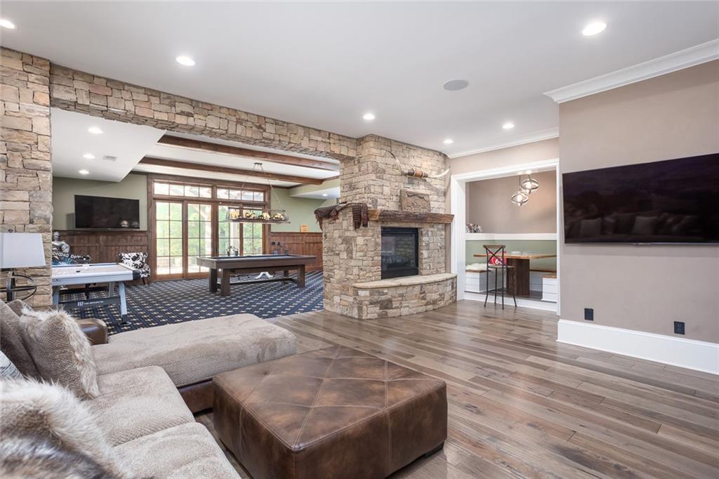 3084 George Williams Road Monroe, GA 30656 - Photo 28 of 55 a living room with furniture flat screen tv and fireplace