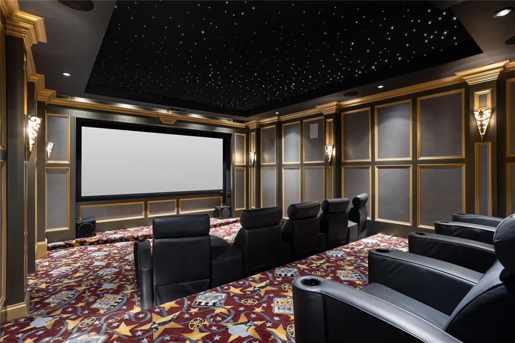 3084 George Williams Road Monroe, GA 30656 - Photo 32 of 55 a room with furniture projector and screen