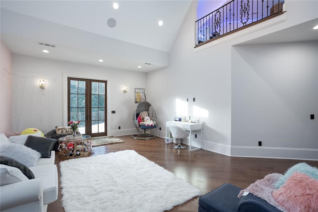 3084 George Williams Road Monroe, GA 30656 - Photo 36 of 55 a living room with furniture and a table