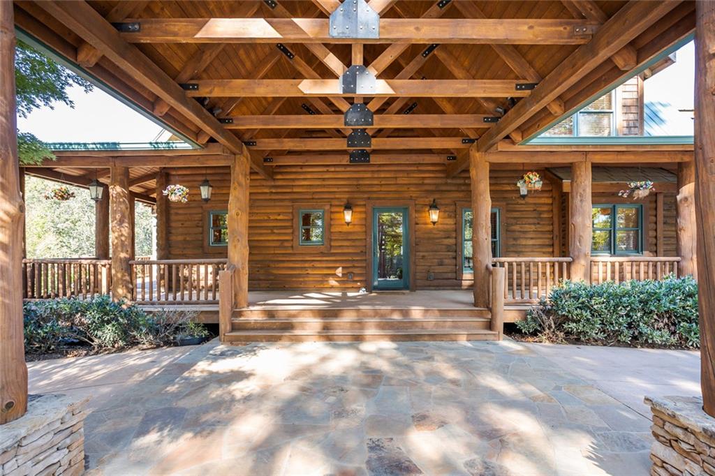 3084 George Williams Road Monroe, GA 30656 - Photo 41 of 55 a view of porch with a table and chairs and potted plants