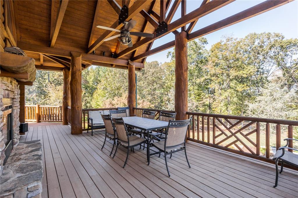 3084 George Williams Road Monroe, GA 30656 - Photo 47 of 55 a view of a balcony with furniture and wooden floor