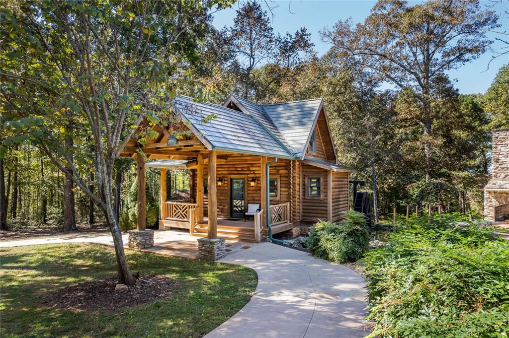 3084 George Williams Road Monroe, GA 30656 - Photo 49 of 55 a view of a building with a garden