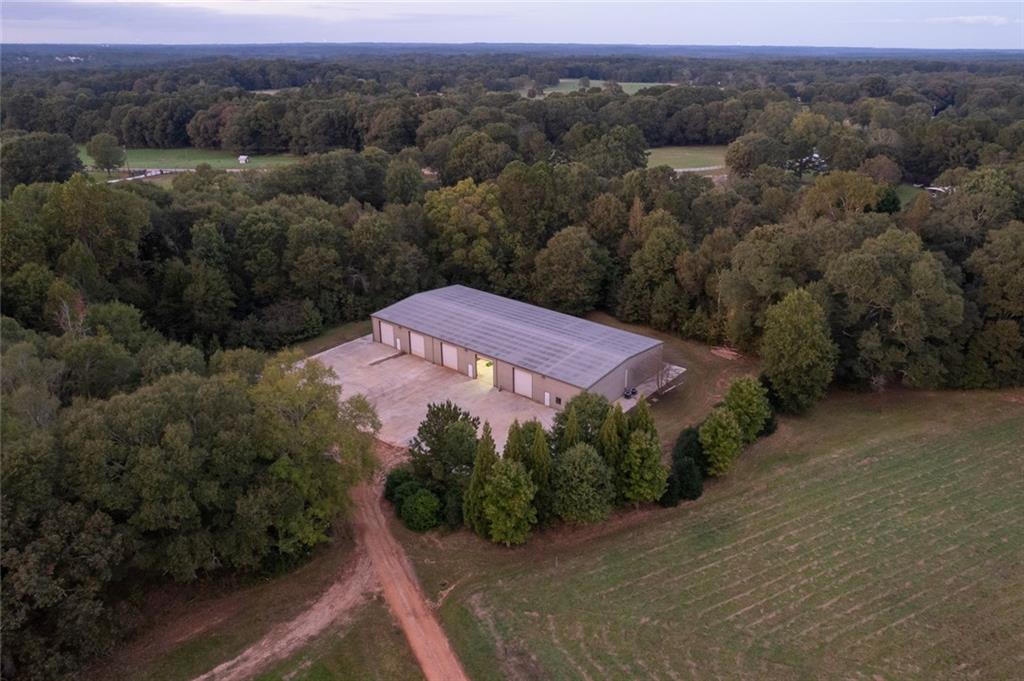 3084 George Williams Road Monroe, GA 30656 - Photo 55 of 55 an aerial view of a house with a garden