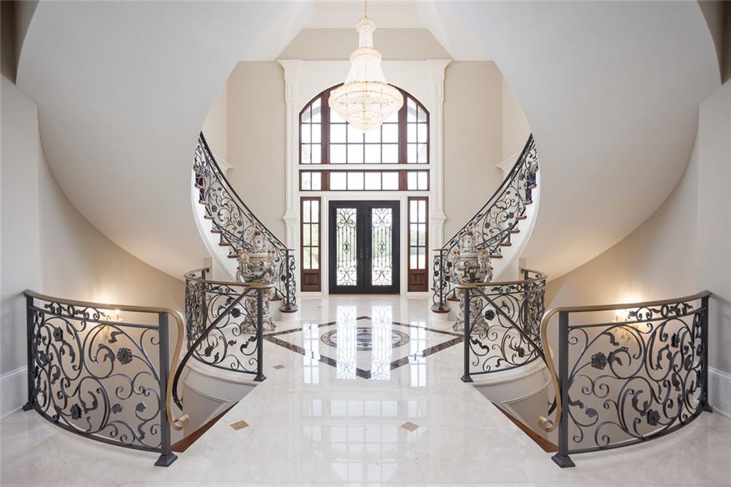 3084 George Williams Road Monroe, GA 30656 - Photo 7 of 55 a view of an entryway with a lot of windows and stairs