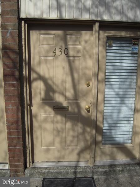 Centre, Unit 430 Norristown, PA 19403 - Photo 29 of 29 a bathroom with a glass shower door