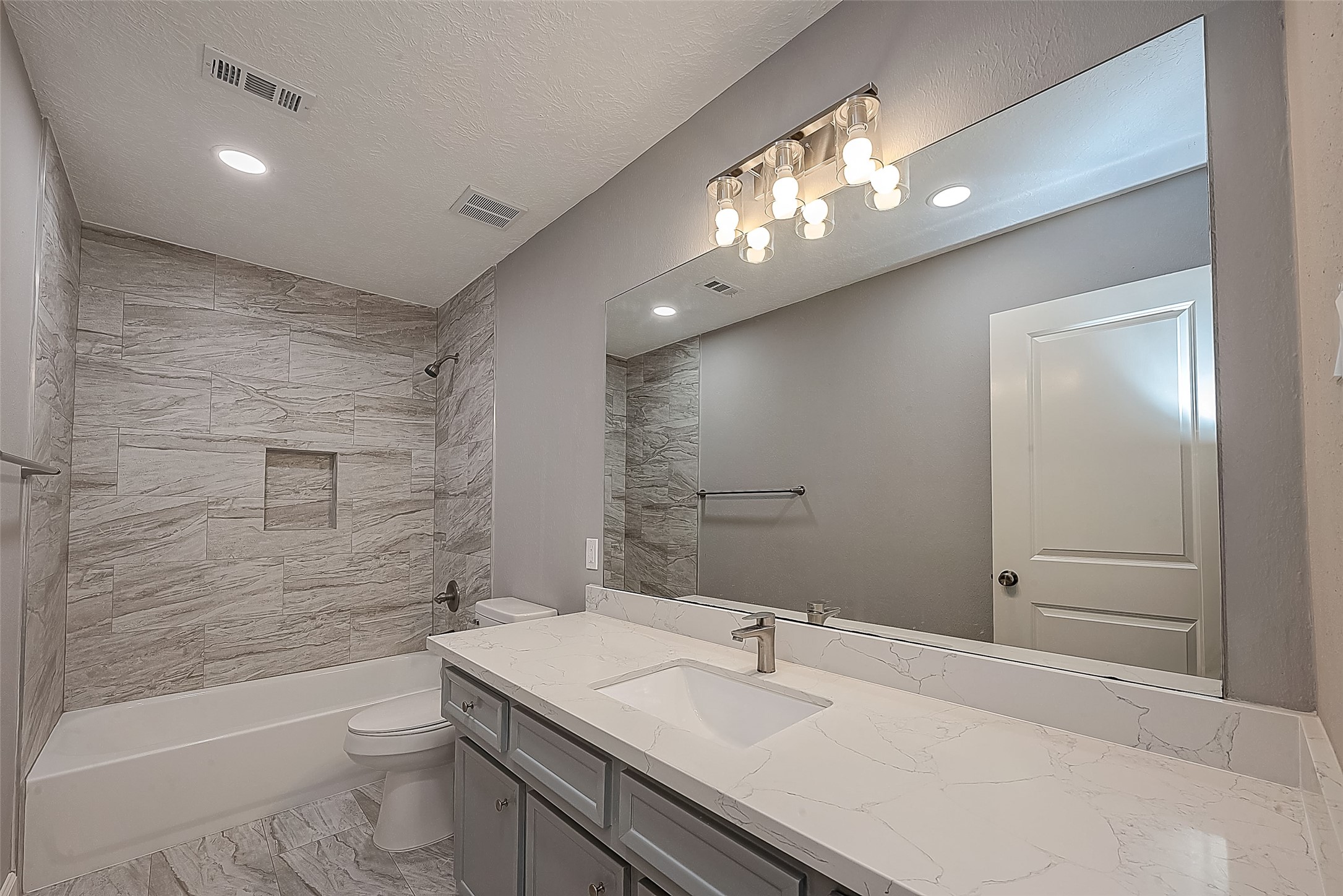 1623 Cherry Ridge Drive Houston, TX 77077 - Photo 14 of 44 a bathroom with a sink a toilet and shower