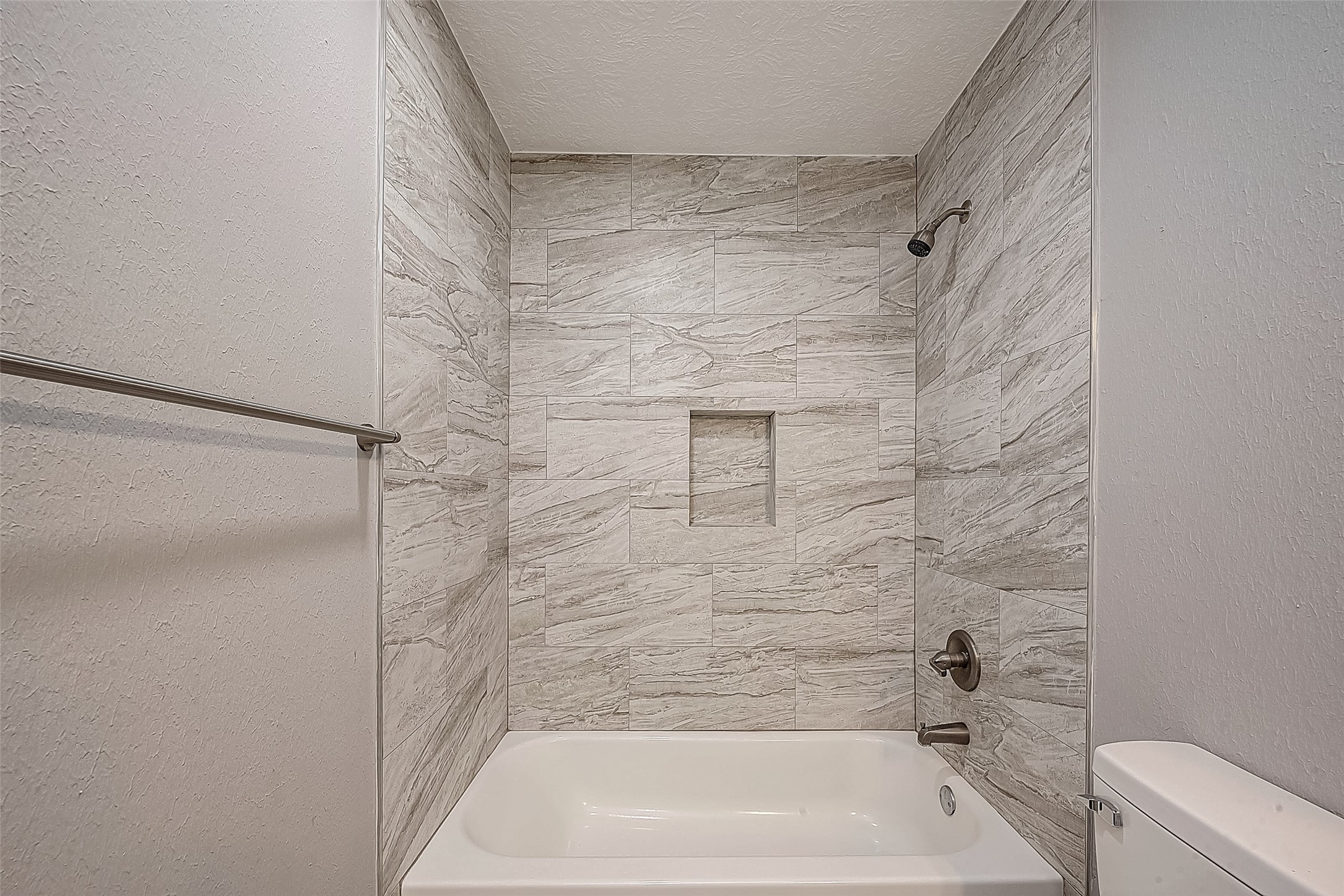 1623 Cherry Ridge Drive Houston, TX 77077 - Photo 15 of 44 a bathroom with a bathtub