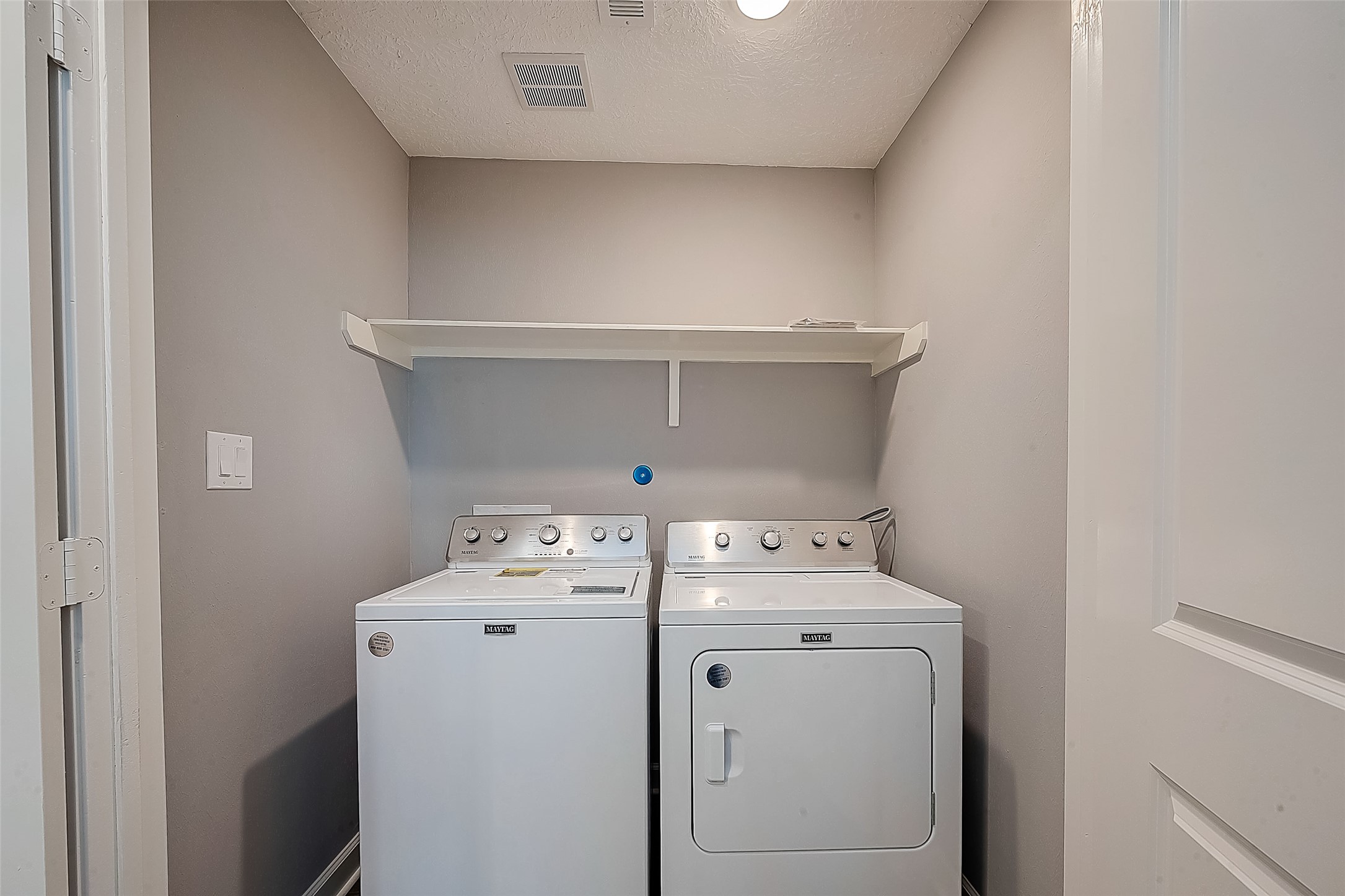 1623 Cherry Ridge Drive Houston, TX 77077 - Photo 19 of 44 a utility room with dryer and washer
