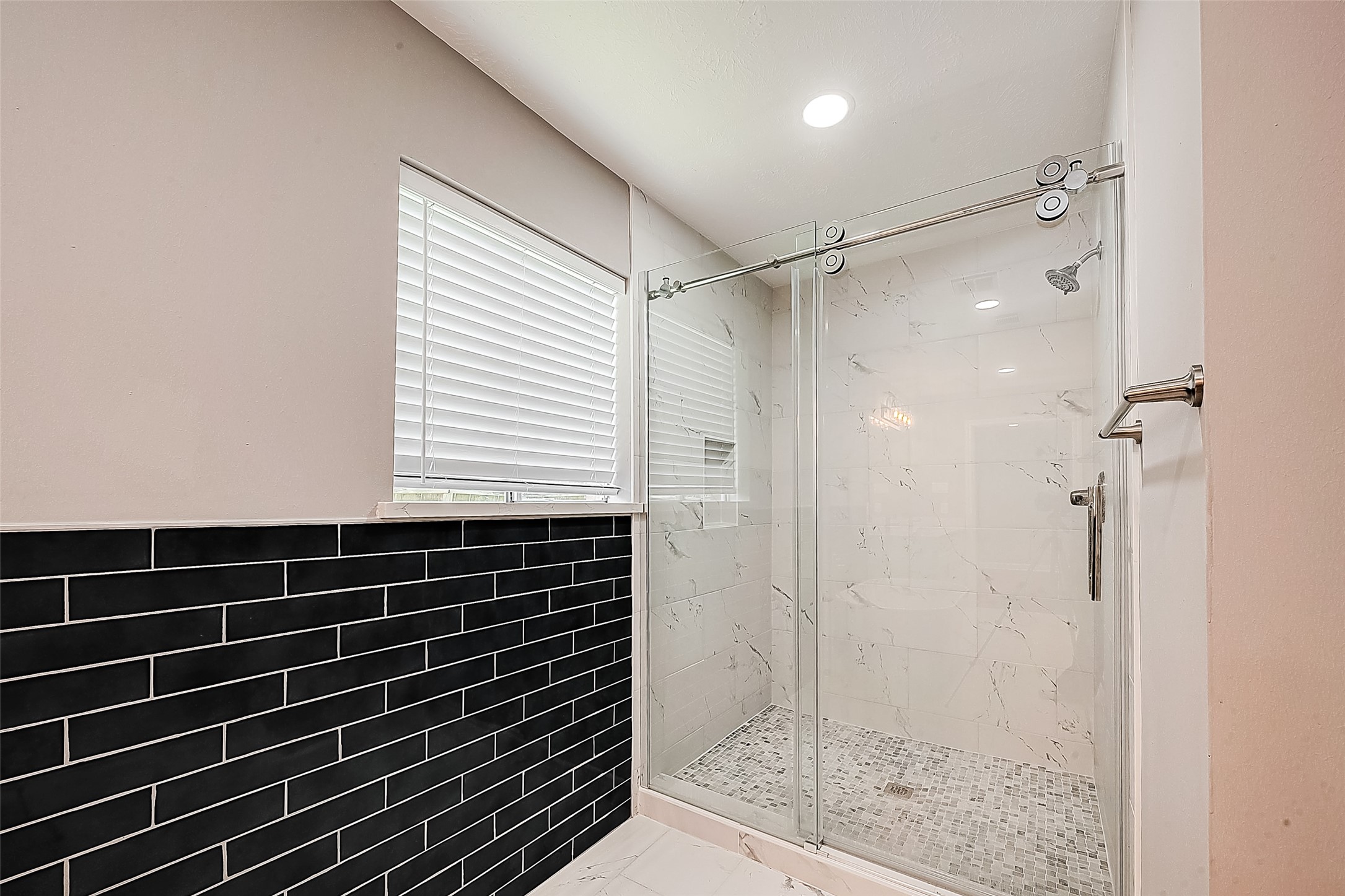 1623 Cherry Ridge Drive Houston, TX 77077 - Photo 29 of 44 a bathroom with a shower and a sink