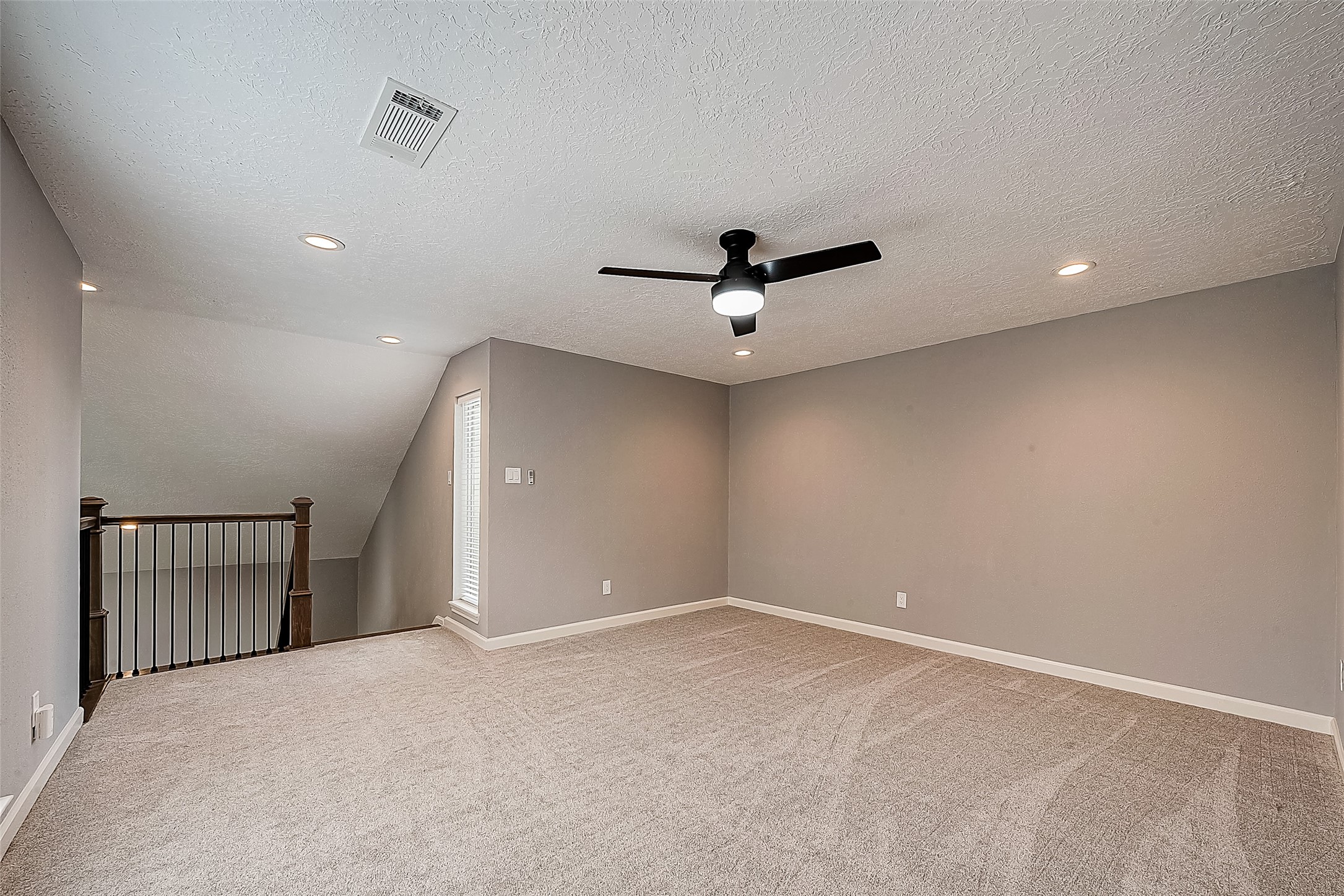 1623 Cherry Ridge Drive Houston, TX 77077 - Photo 34 of 44 a view of a livingroom with a ceiling fan and window