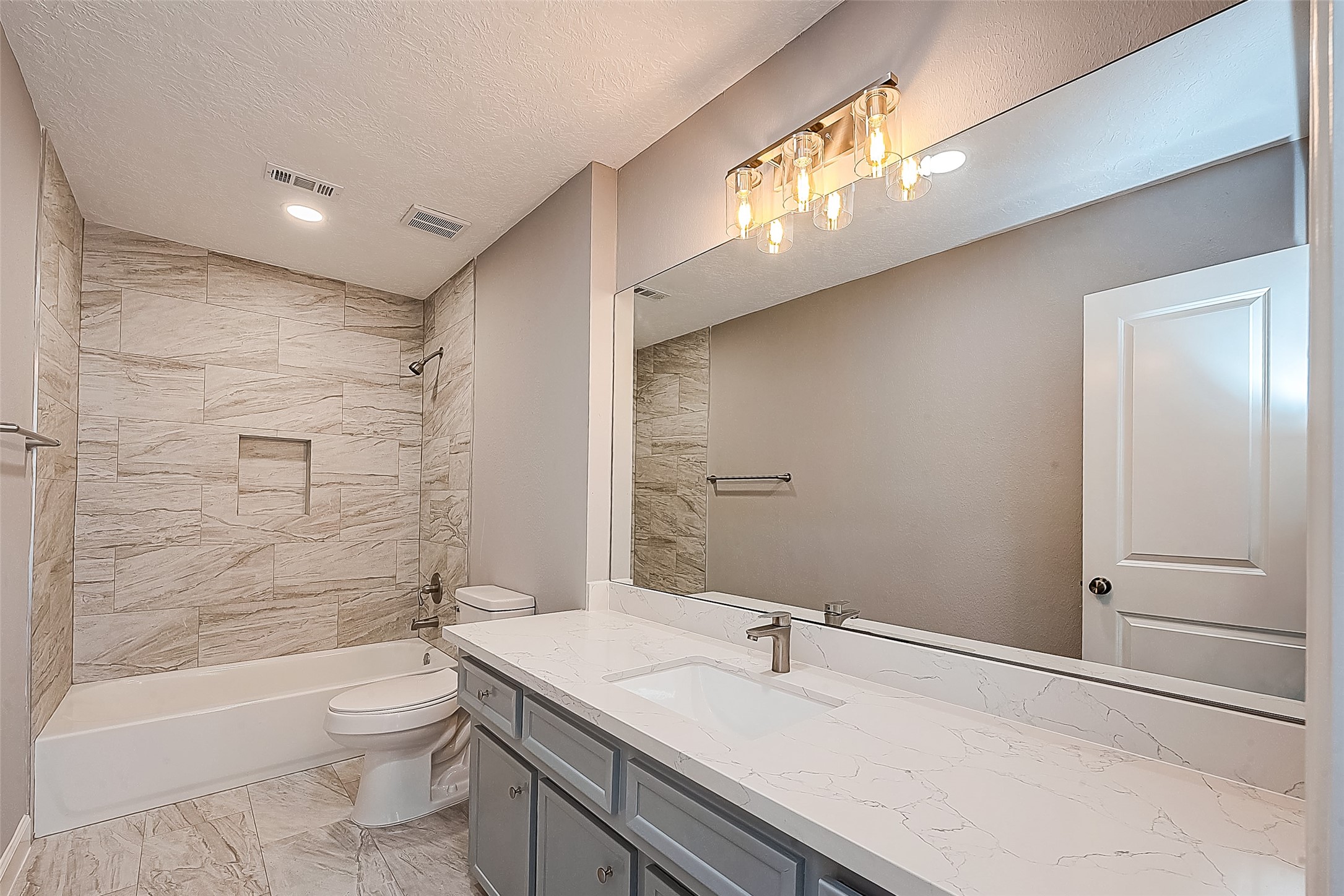 1623 Cherry Ridge Drive Houston, TX 77077 - Photo 35 of 44 a bathroom with a sink a toilet and shower