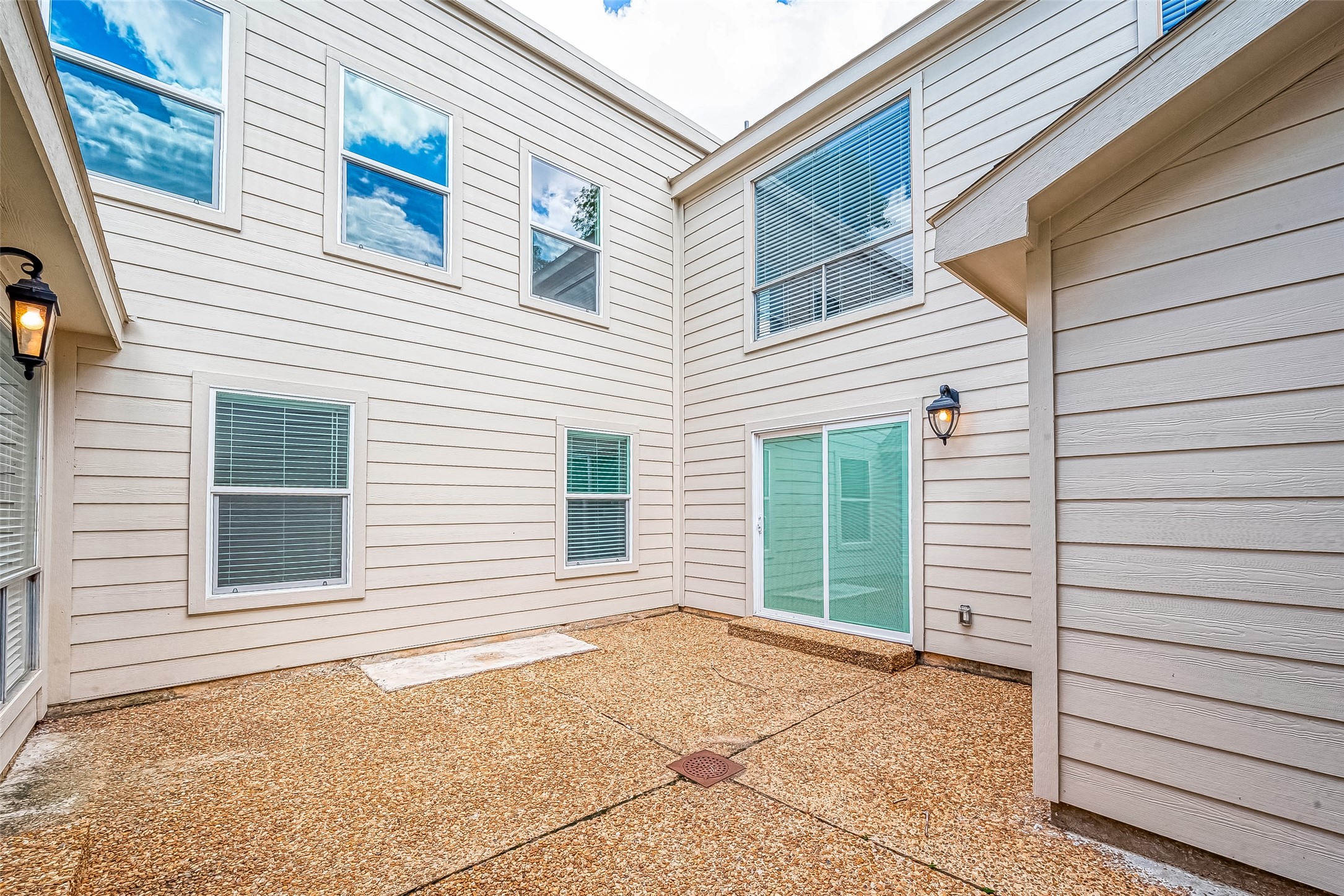 1623 Cherry Ridge Drive Houston, TX 77077 - Photo 40 of 44 a view of a house with a backyard