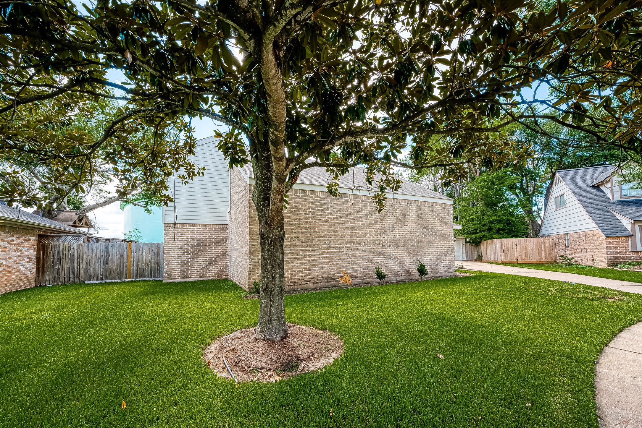1623 Cherry Ridge Drive Houston, TX 77077 - Photo 44 of 44 a swimming pool with lots of tress in front of it