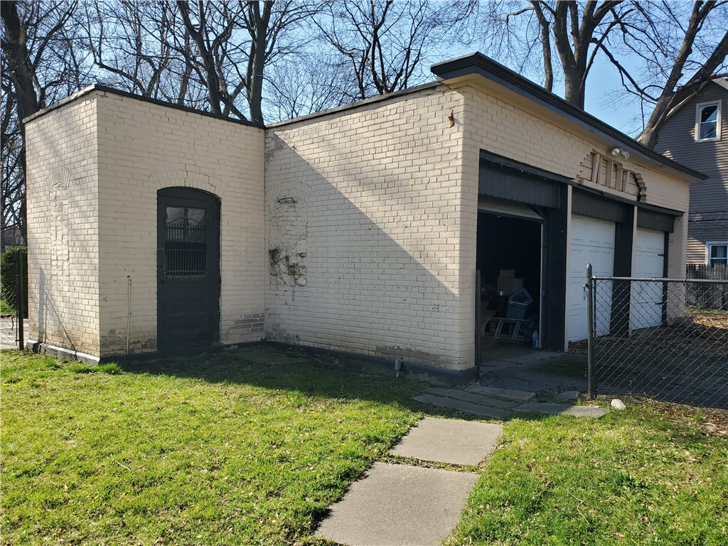 202 Parsells Avenue Rochester, NY 14609 - Photo 11 of 49 3 car block garage with dog house attachment