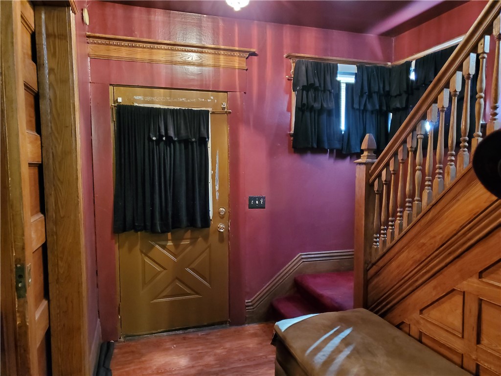 202 Parsells Avenue Rochester, NY 14609 - Photo 31 of 49 First floor foyer and staircase