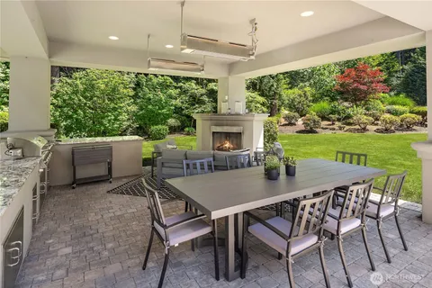 a view of a dining room with furniture window and outside view