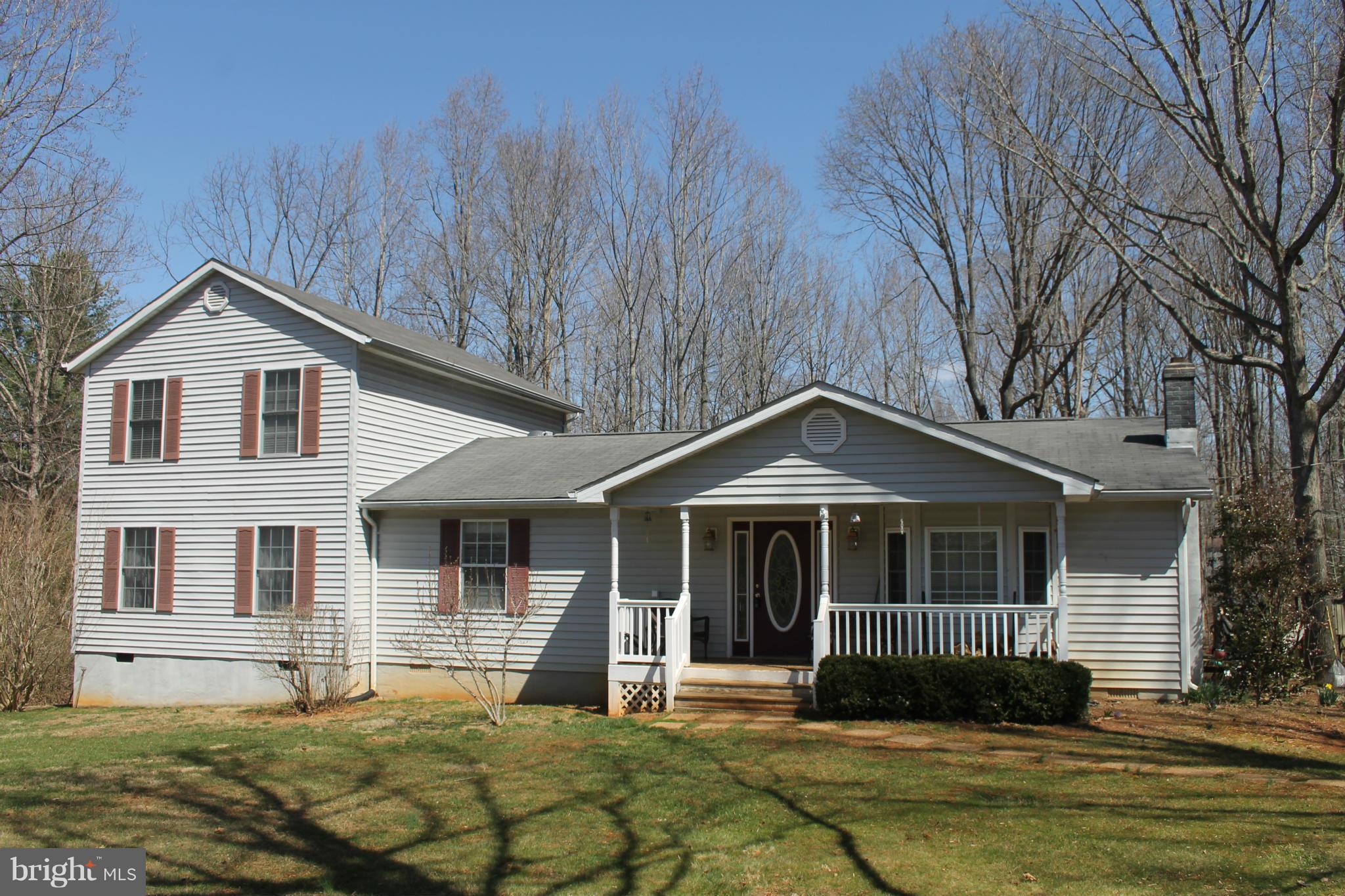 10275 Dutch Hollow Road Rixeyville, VA 22737 - Photo 1 of 21 a front view of a house with a yard