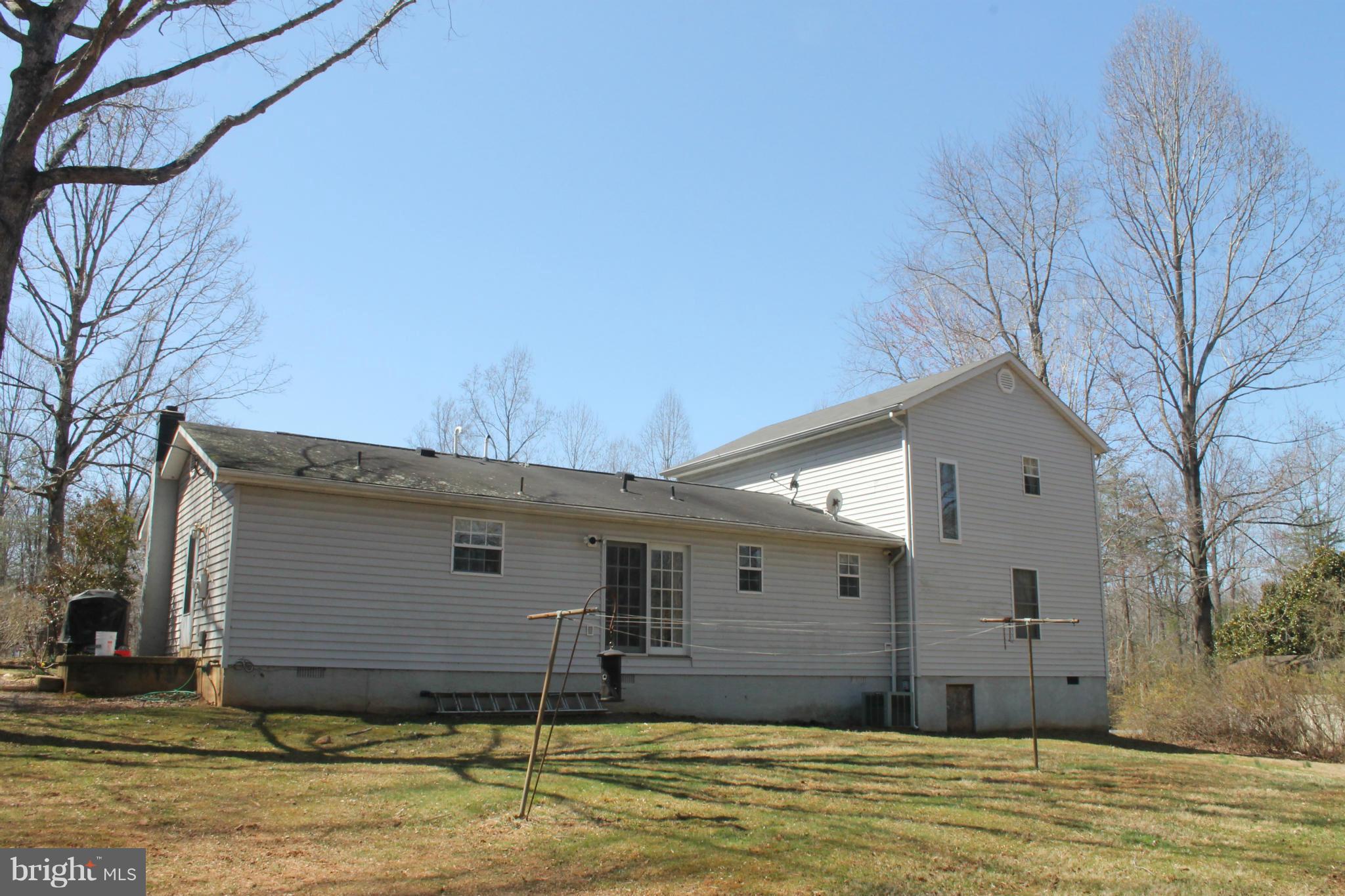 10275 Dutch Hollow Road Rixeyville, VA 22737 - Photo 20 of 21 a house view with a backyard space
