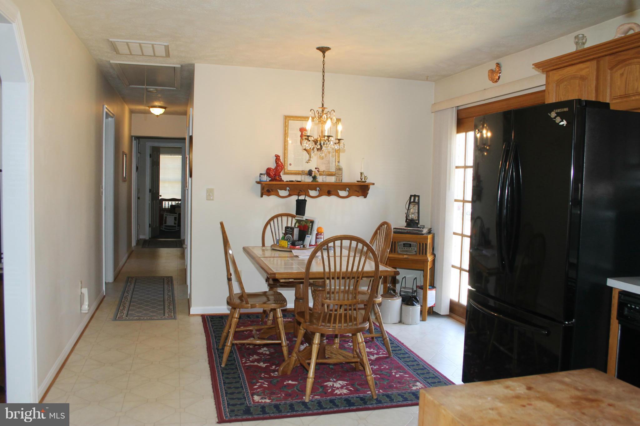 10275 Dutch Hollow Road Rixeyville, VA 22737 - Photo 8 of 21 a dining room with furniture window and outside view