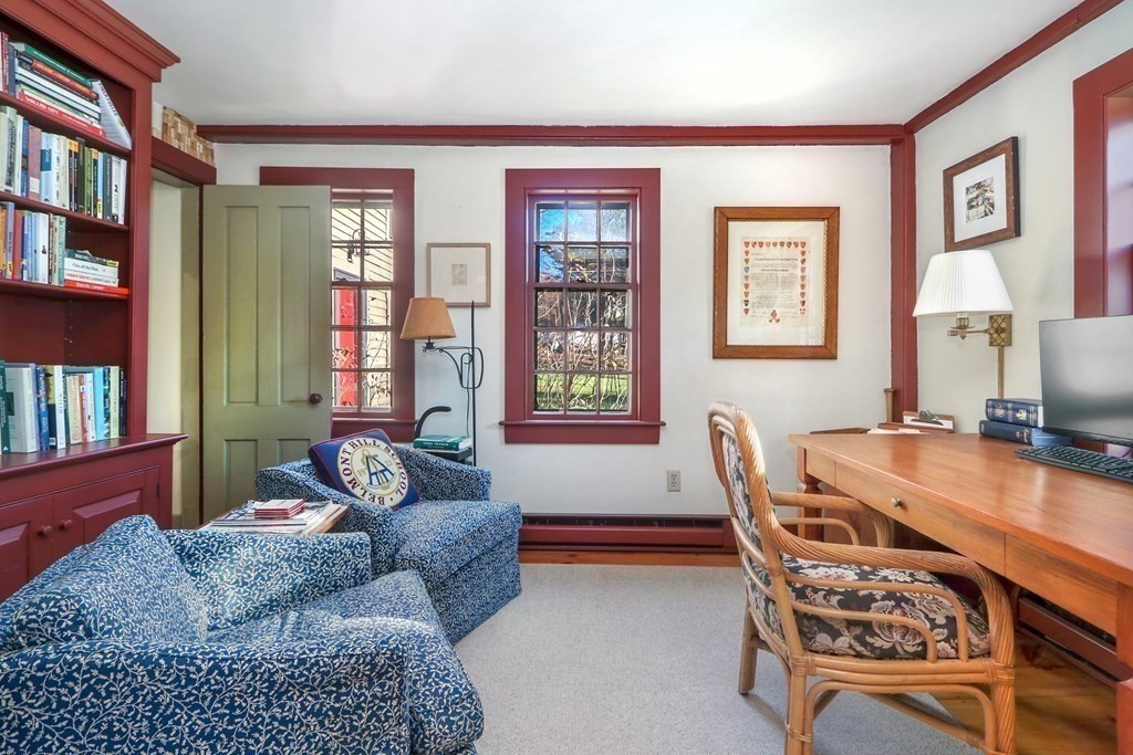 150 Concord Road Sudbury, MA 01776 - Photo 16 of 34 a living room with furniture and a window