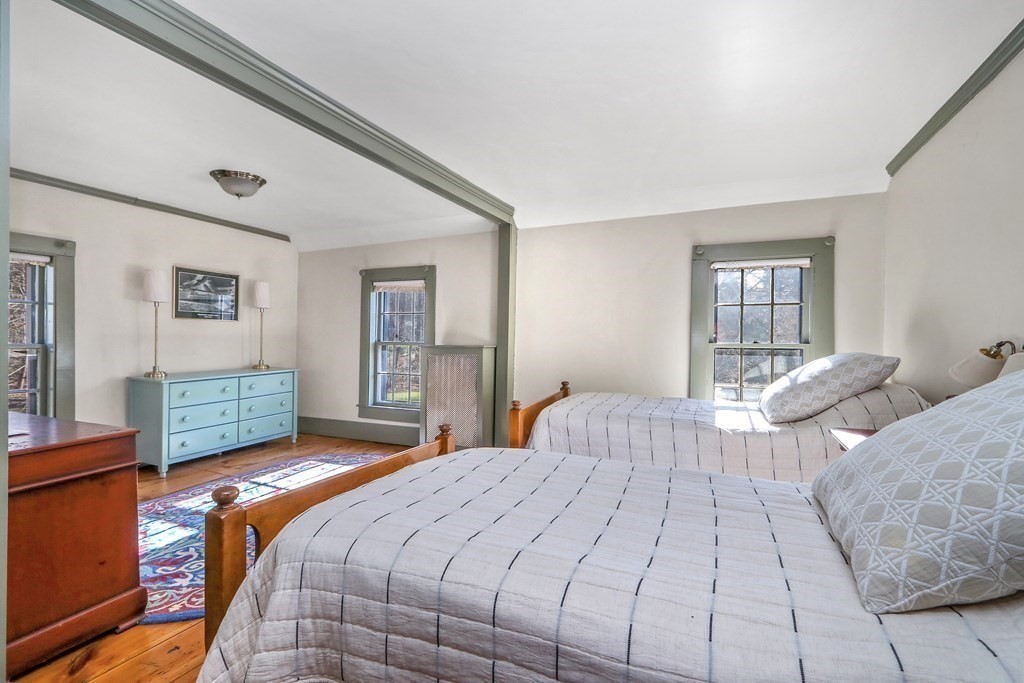 150 Concord Road Sudbury, MA 01776 - Photo 19 of 34 a bedroom with double bed and a window