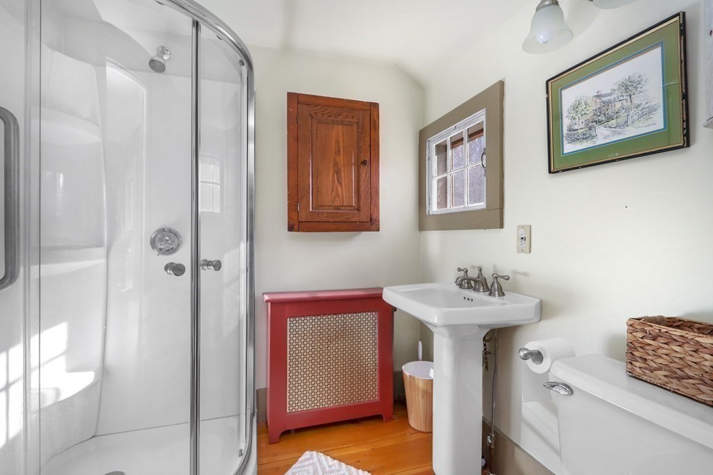 150 Concord Road Sudbury, MA 01776 - Photo 20 of 34 a bathroom with a sink and a mirror