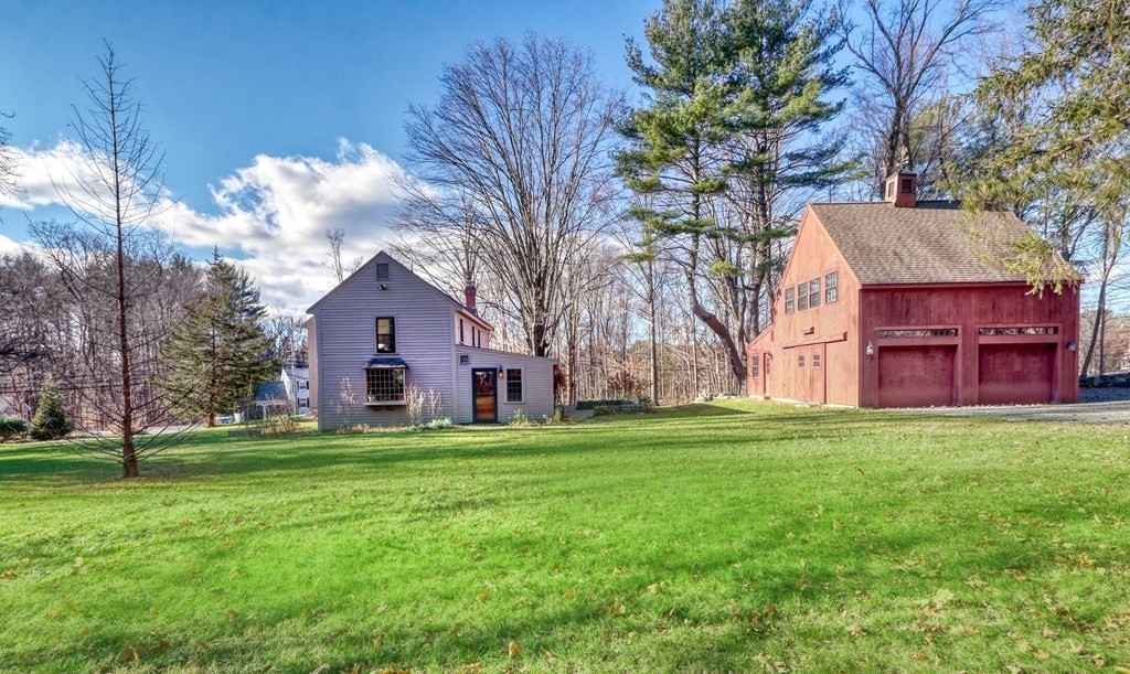 150 Concord Road Sudbury, MA 01776 - Photo 2 of 34 a house view with a sitting space and garden