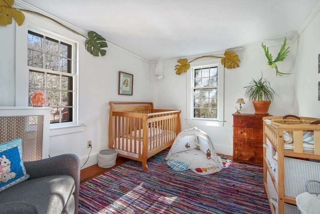 150 Concord Road Sudbury, MA 01776 - Photo 21 of 34 a living room with furniture and wooden floor