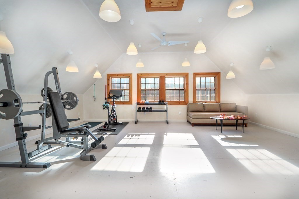 150 Concord Road Sudbury, MA 01776 - Photo 26 of 34 a living room with furniture a window and a table