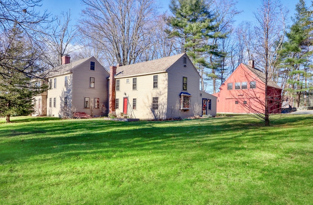 150 Concord Road Sudbury, MA 01776 - Photo 3 of 34 a front view of house with yard and green space