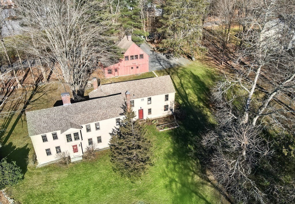 150 Concord Road Sudbury, MA 01776 - Photo 33 of 34 a backyard of a house with lots of green space