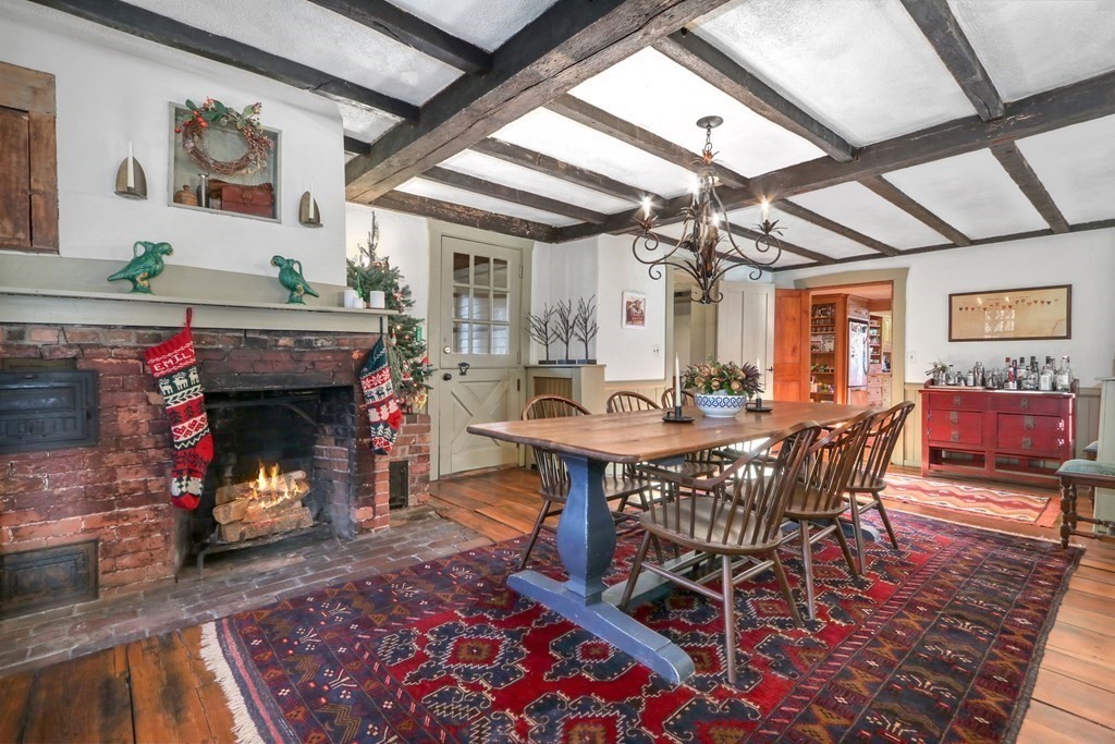 150 Concord Road Sudbury, MA 01776 - Photo 9 of 34 a view of a dining room with furniture window and wooden floor