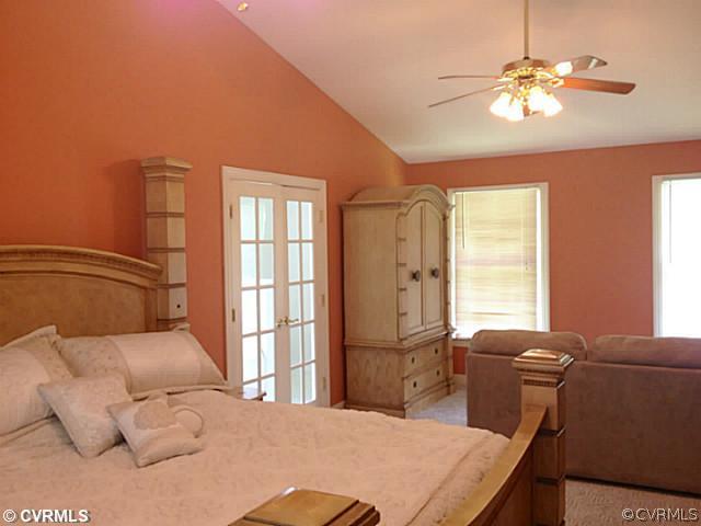 15504 Nash Road Dewitt, VA 23840 - Photo 11 of 18 a bedroom with a bed dresser and a window