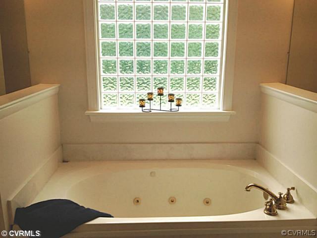 15504 Nash Road Dewitt, VA 23840 - Photo 12 of 18 a bathroom with a bathtub