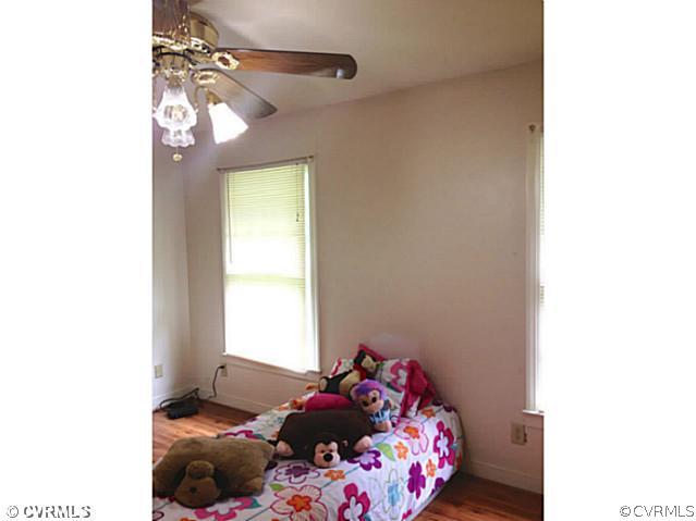 15504 Nash Road Dewitt, VA 23840 - Photo 13 of 18 a bedroom with a bed and a window