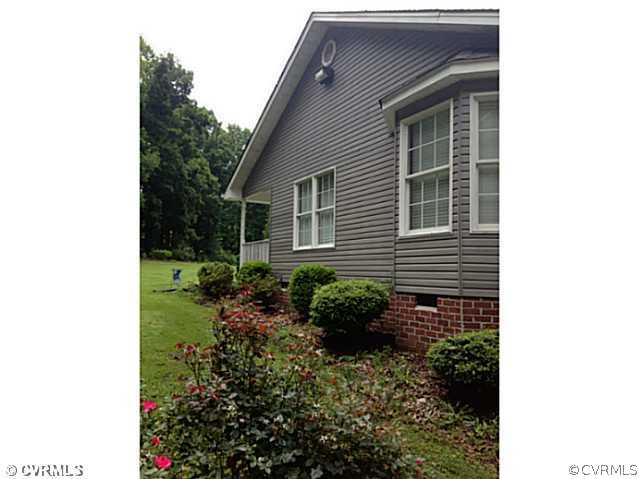 15504 Nash Road Dewitt, VA 23840 - Photo 17 of 18 a view of a backyard with plants