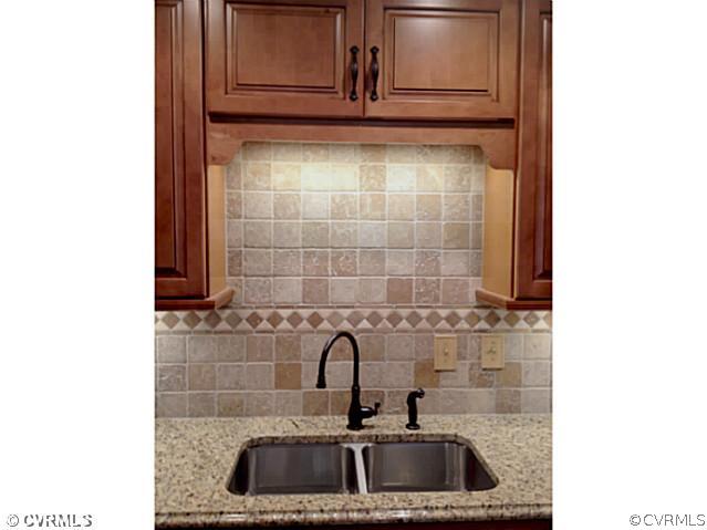 15504 Nash Road Dewitt, VA 23840 - Photo 6 of 18 a close view of a sink and a mirror in a bathroom