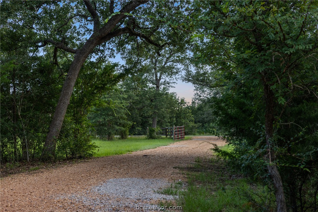 6951 Watermelon Road Somerville, TX 77879 - Photo 2 of 48 Located at the end of a quiet country road with no through traffic, you'll enjoy privacy and seclusion while remaining just minutes from Snook ISD schools and less than 15 minutes from Texas A&M University, Kyle Field, RELLIS Campus, and all the shopping, dining, and medical amenities of Bryan-College Station.