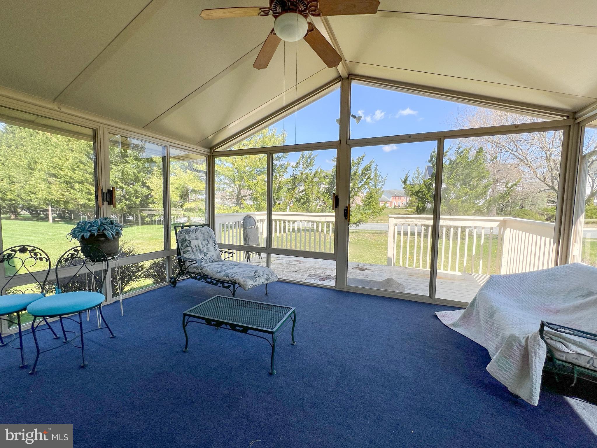 214 Mt Vernon Drive Bear, DE 19701 - Photo 13 of 44 a living room with furniture and a floor to ceiling window